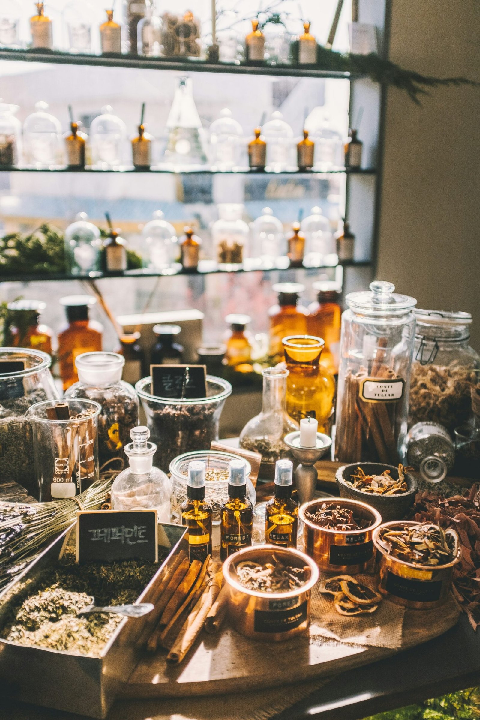 Dried Chinese herbs and roots laid out on the dispensary counter at Chee Seng Tong